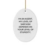 Funny Agent Gifts from Friends - 'I'm An Agent. My Level Of Sarcasm Depends On Your Level Of Stupidity.' Oval Ornament for Christmas - Image 1